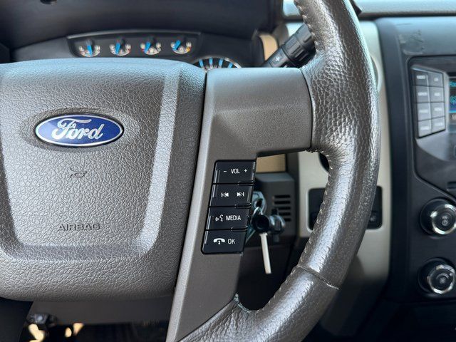 Used 2013 Blue Flame Metallic Ford  image 19