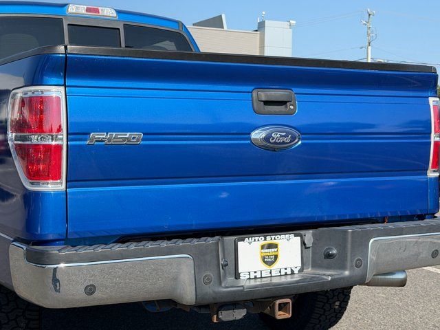 Used 2013 Blue Flame Metallic Ford  image 32