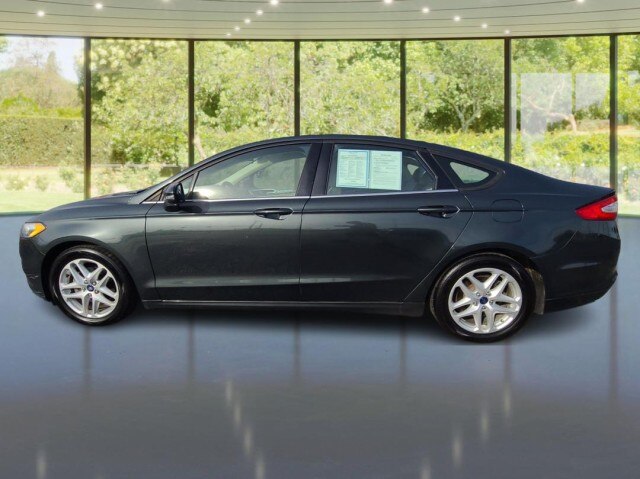 Used 2015 Ford Fusion SE with VIN 3FA6P0HD1FR218234 for sale in Davenport, IA