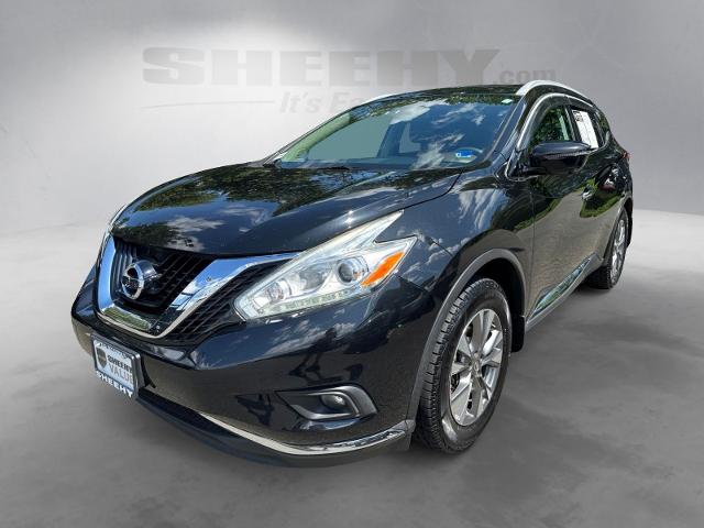 Used 2017 Magnetic Black Nissan  image 16