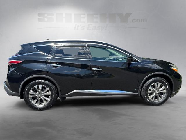 Used 2017 Magnetic Black Nissan  image 9