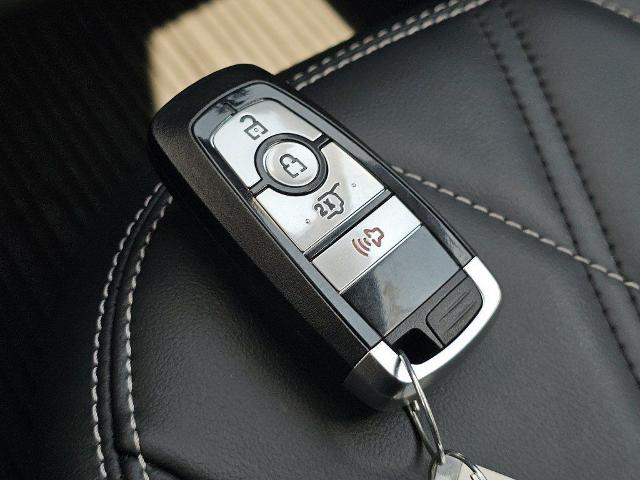Used 2023 White Metallic Ford  image 31
