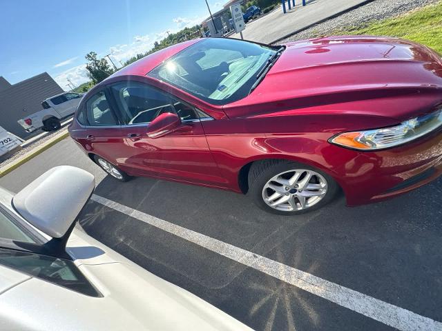 Used 2016 Ruby Red Tinted Clearcoat Ford SE image 25